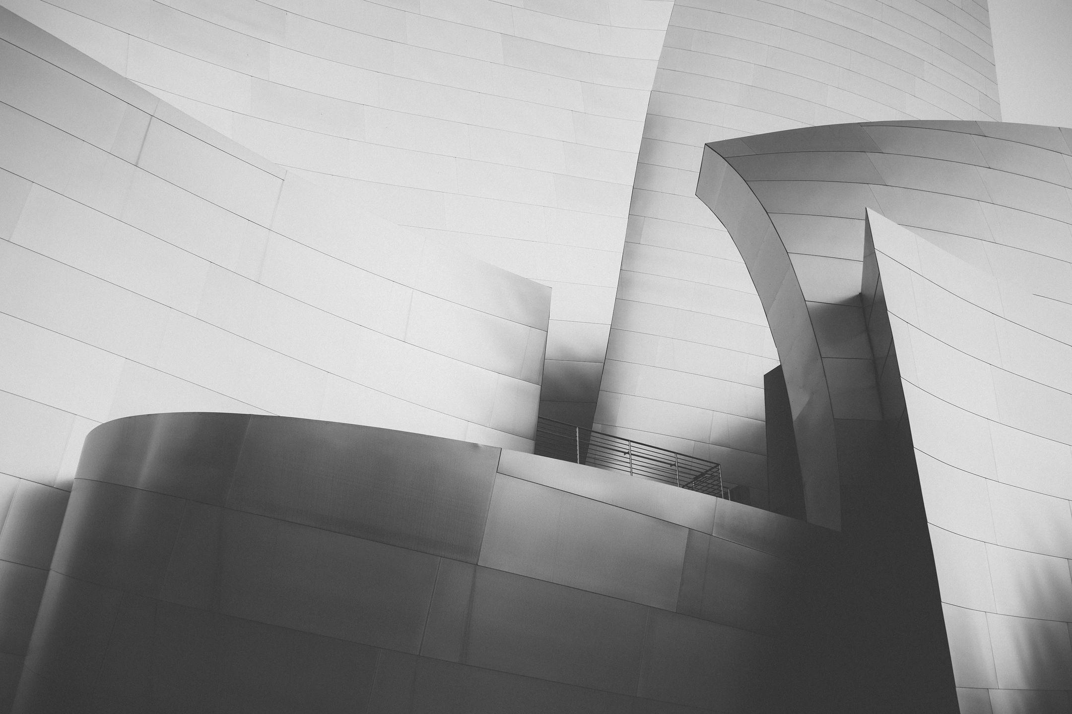 A black and white photo of the outside of an art museum.